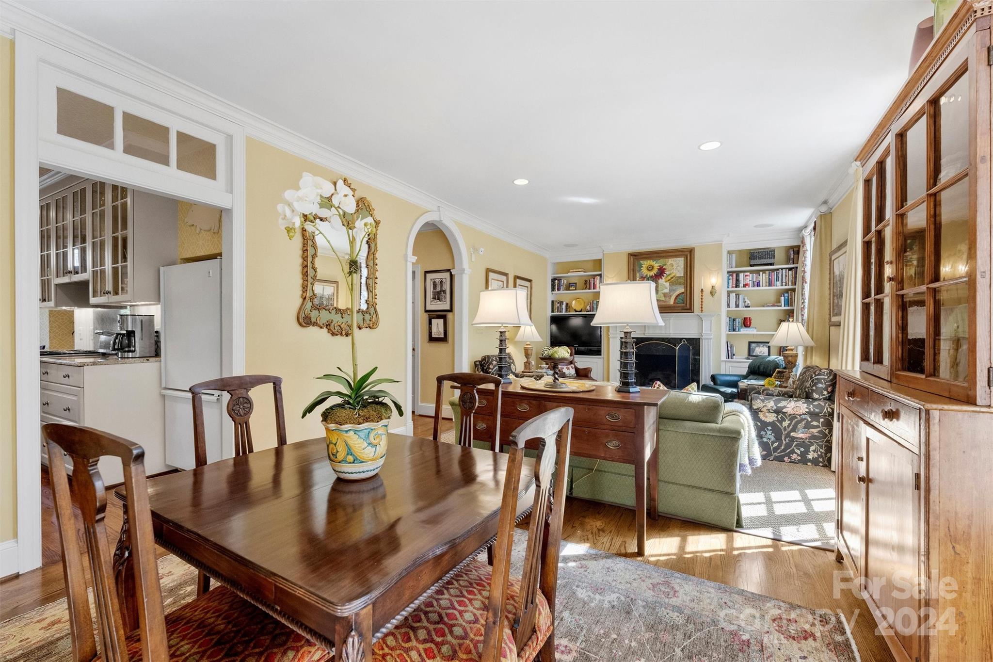 1905 Queens Road Charlotte, NC 28207 - Photo 13 of 44 a living room with fireplace furniture and a table