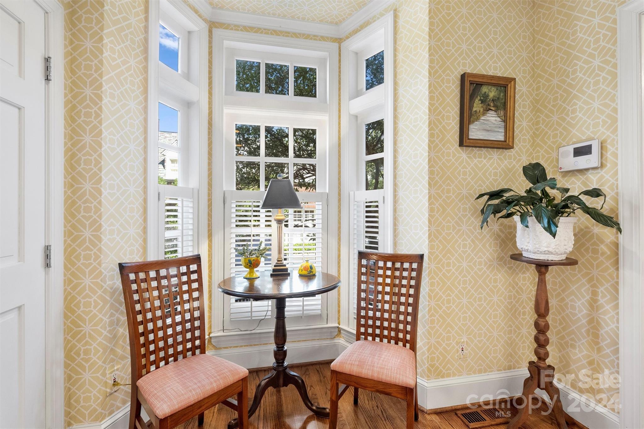 1905 Queens Road Charlotte, NC 28207 - Photo 20 of 44 a view of a livingroom with furniture and wooden floor