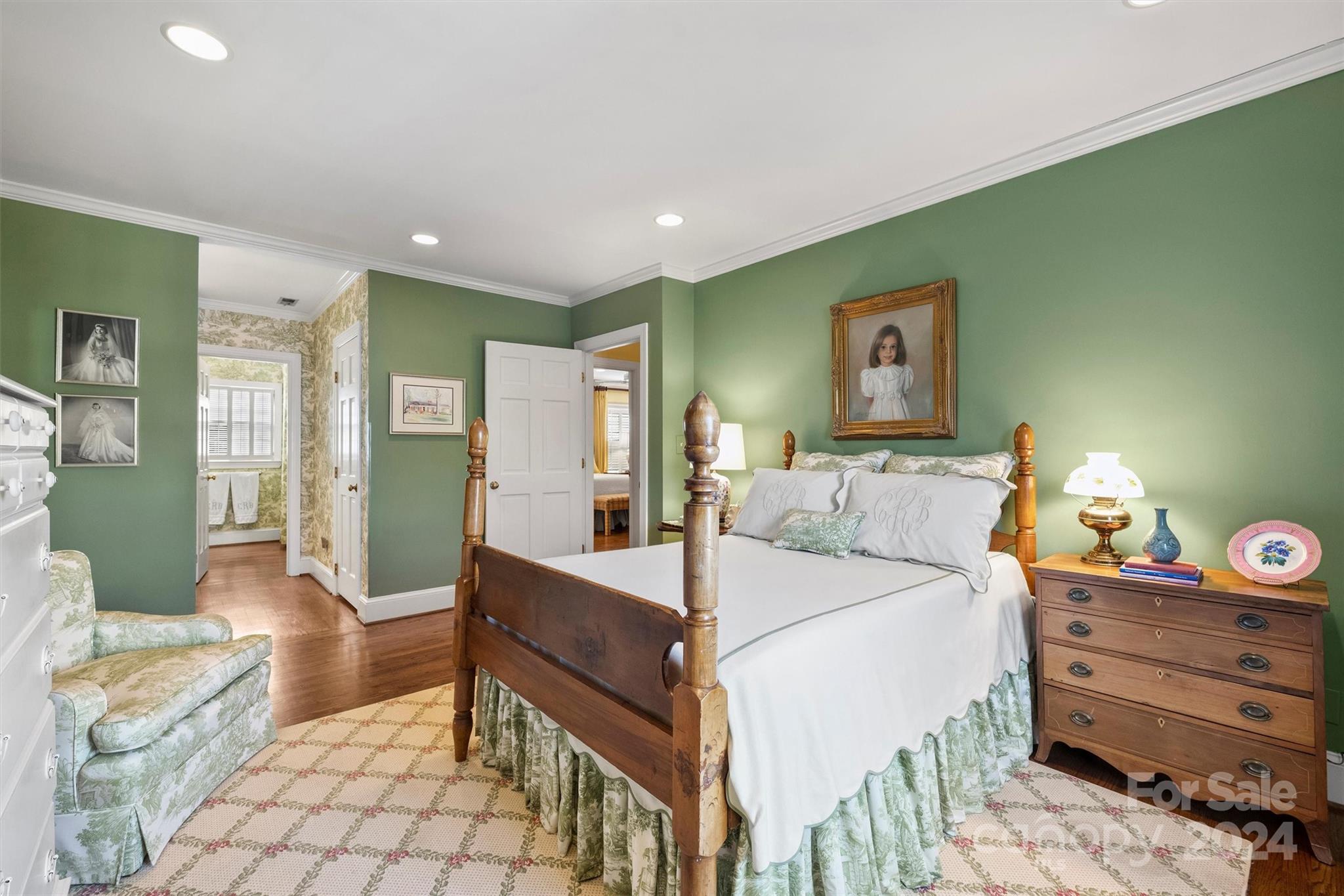 1905 Queens Road Charlotte, NC 28207 - Photo 28 of 44 a bedroom with a bed and a view of bathroom