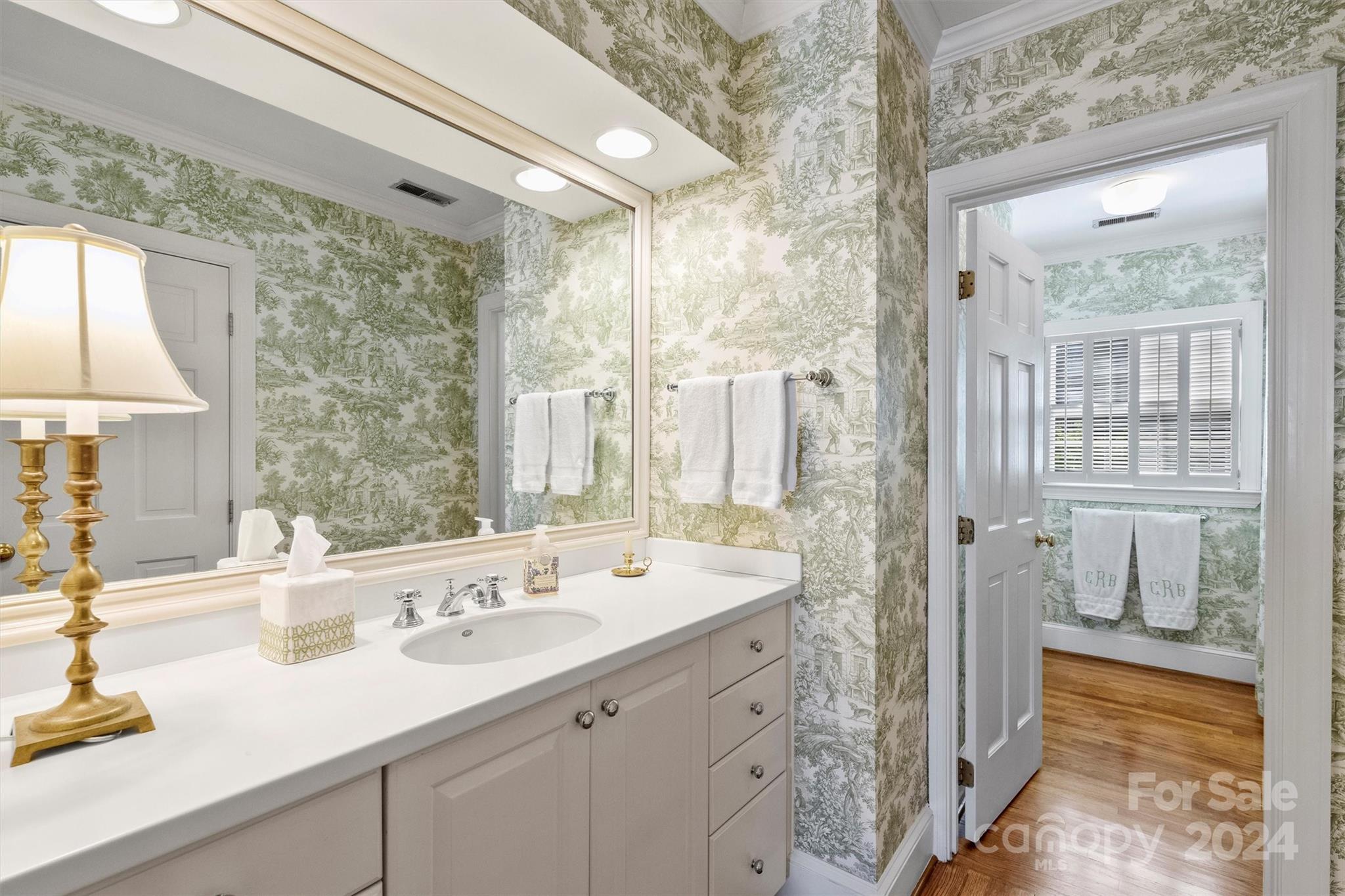 1905 Queens Road Charlotte, NC 28207 - Photo 29 of 44 a bathroom with a double vanity sink mirror and shower