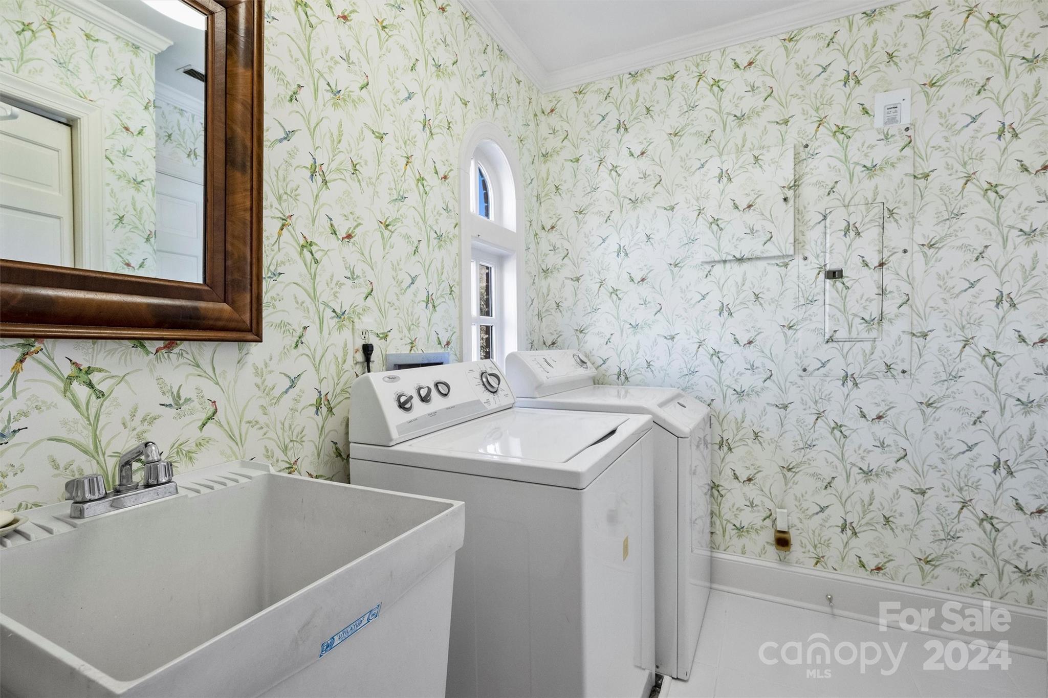 1905 Queens Road Charlotte, NC 28207 - Photo 30 of 44 a bathroom with a sink and a bathtub