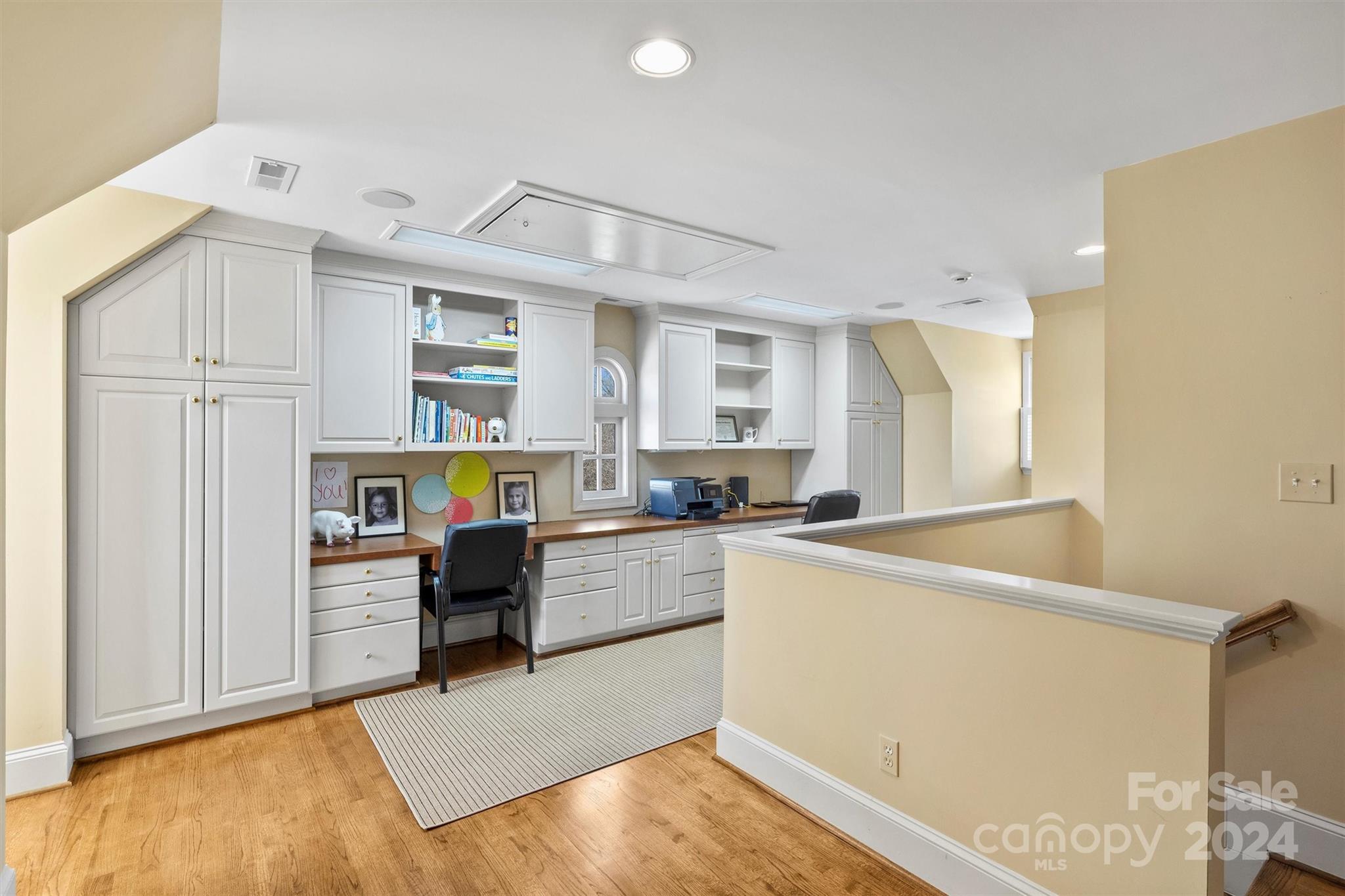 1905 Queens Road Charlotte, NC 28207 - Photo 31 of 44 a kitchen with stainless steel appliances granite countertop a refrigerator and a stove top oven
