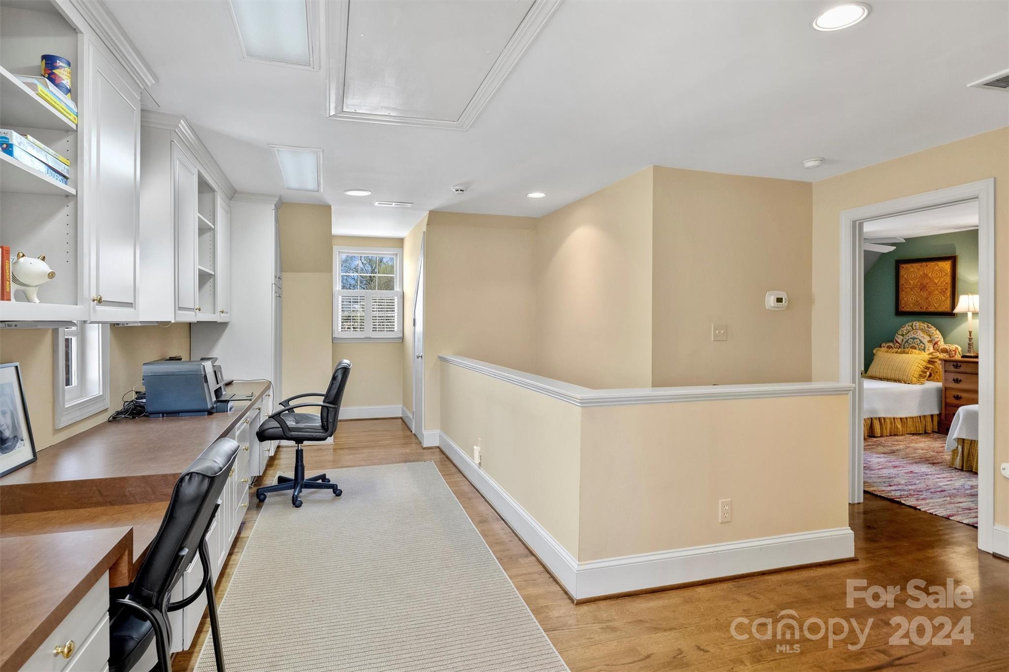 1905 Queens Road Charlotte, NC 28207 - Photo 32 of 44 a workspace with furniture and wooden floor