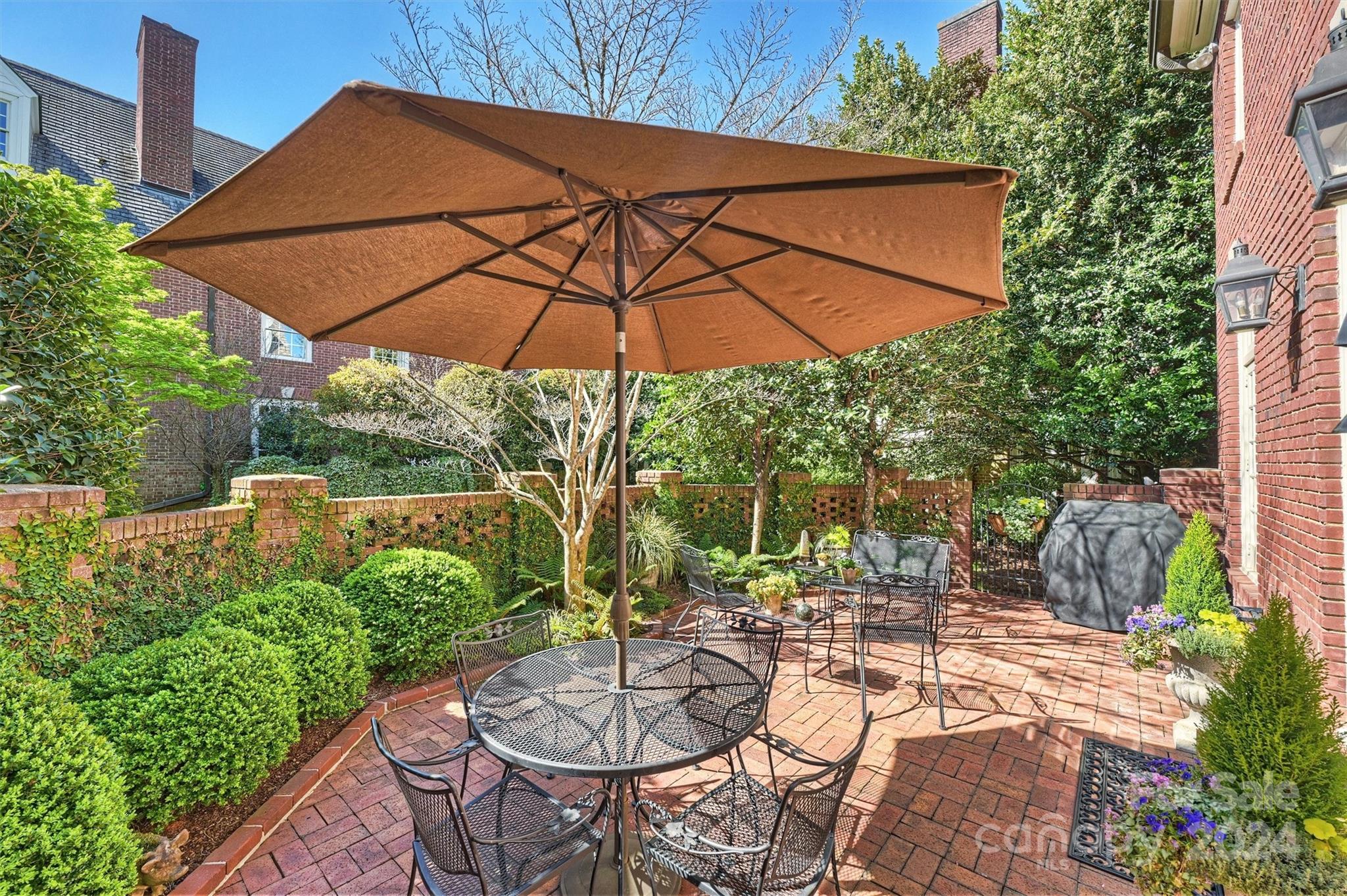 1905 Queens Road Charlotte, NC 28207 - Photo 42 of 44 a view of yard with patio