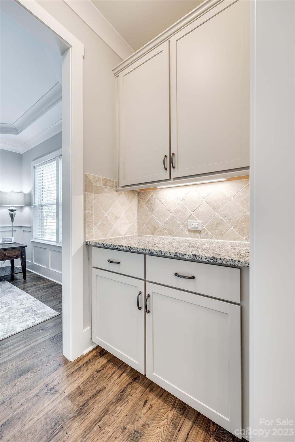 5284 Admirals Landing Lancaster, SC 29720 - Photo 11 of 48 a kitchen with granite countertop white cabinets and white appliances