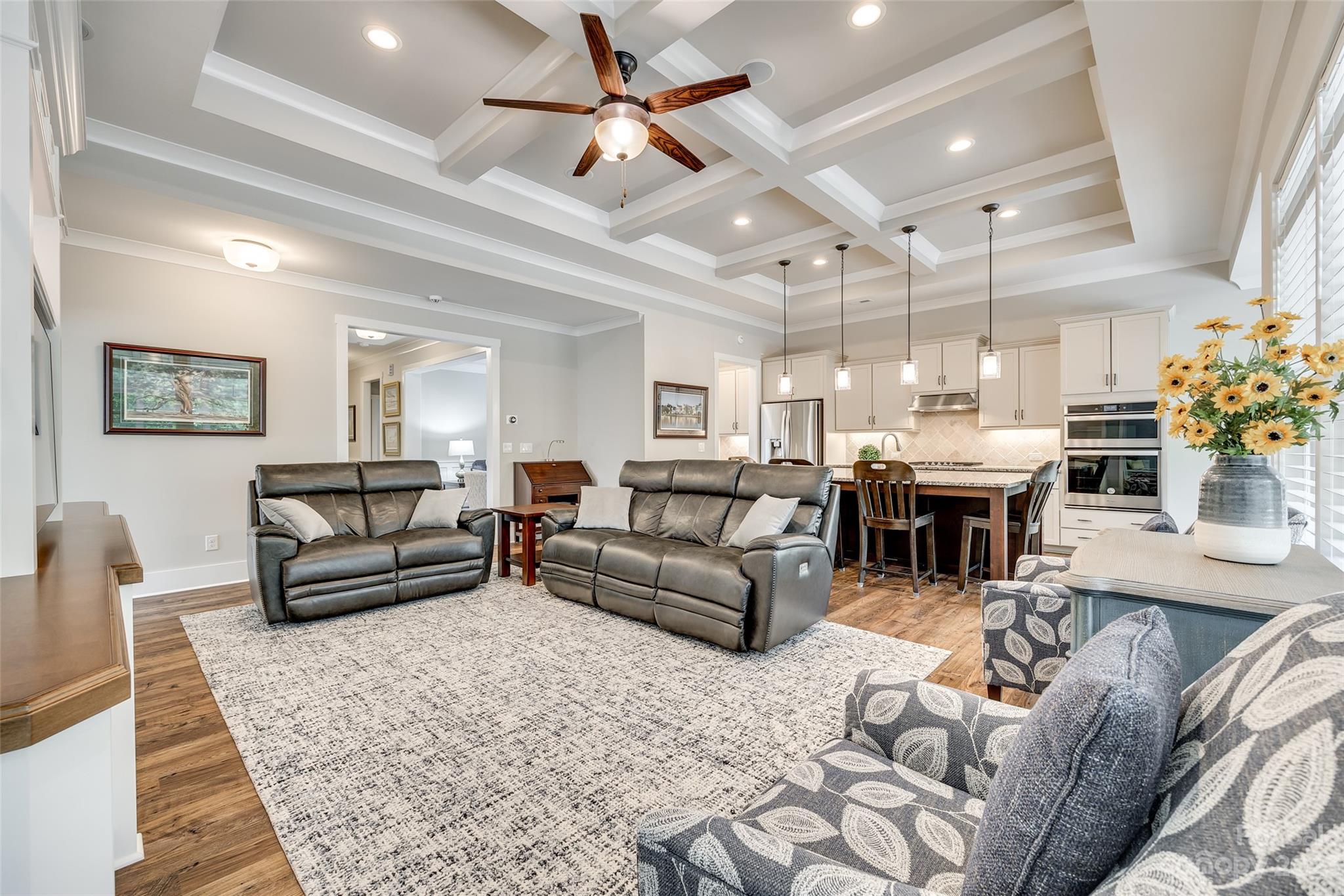 5284 Admirals Landing Lancaster, SC 29720 - Photo 19 of 48 a living room with lots of furniture and a chandelier