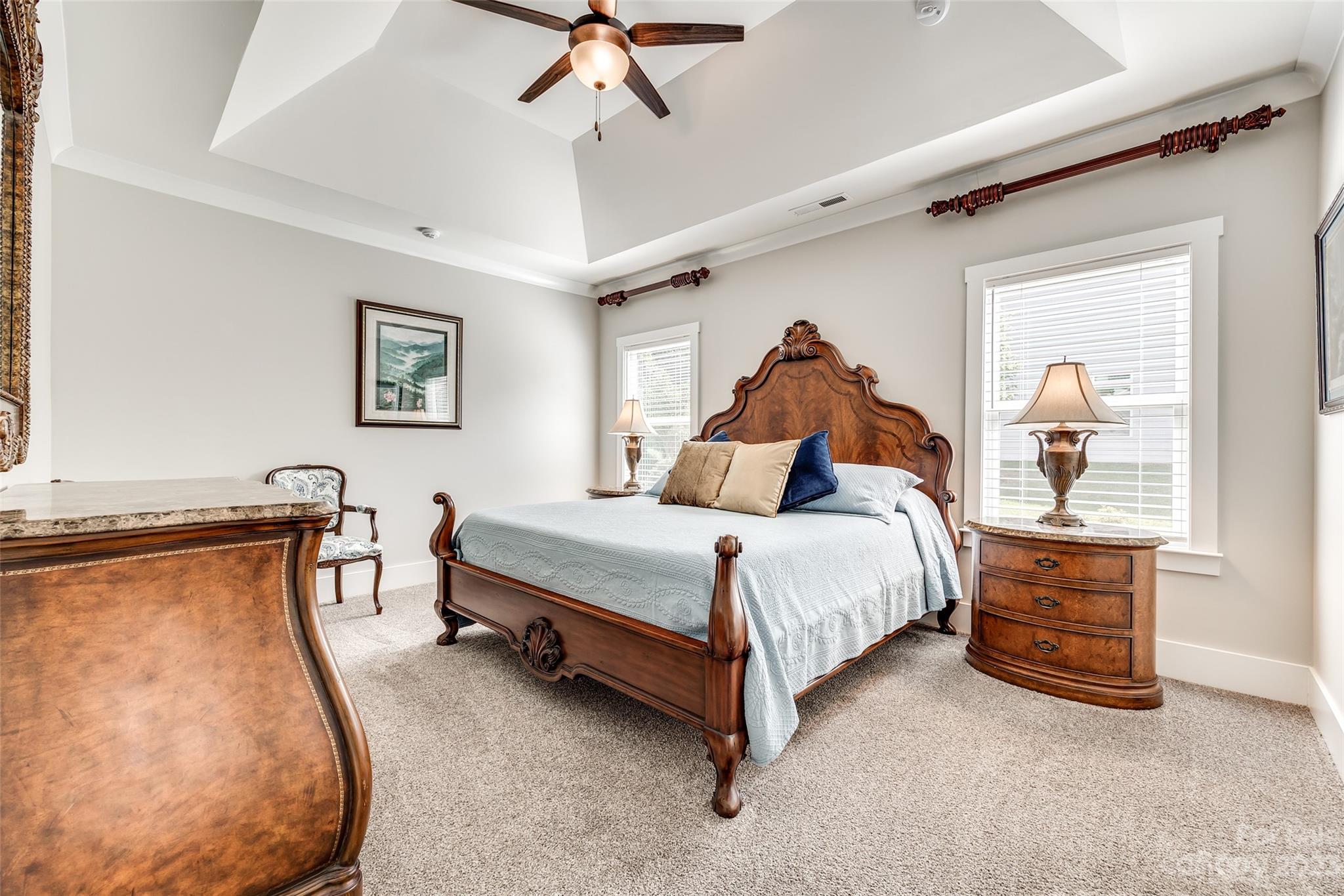 5284 Admirals Landing Lancaster, SC 29720 - Photo 22 of 48 a bed room with a bed and a chandelier