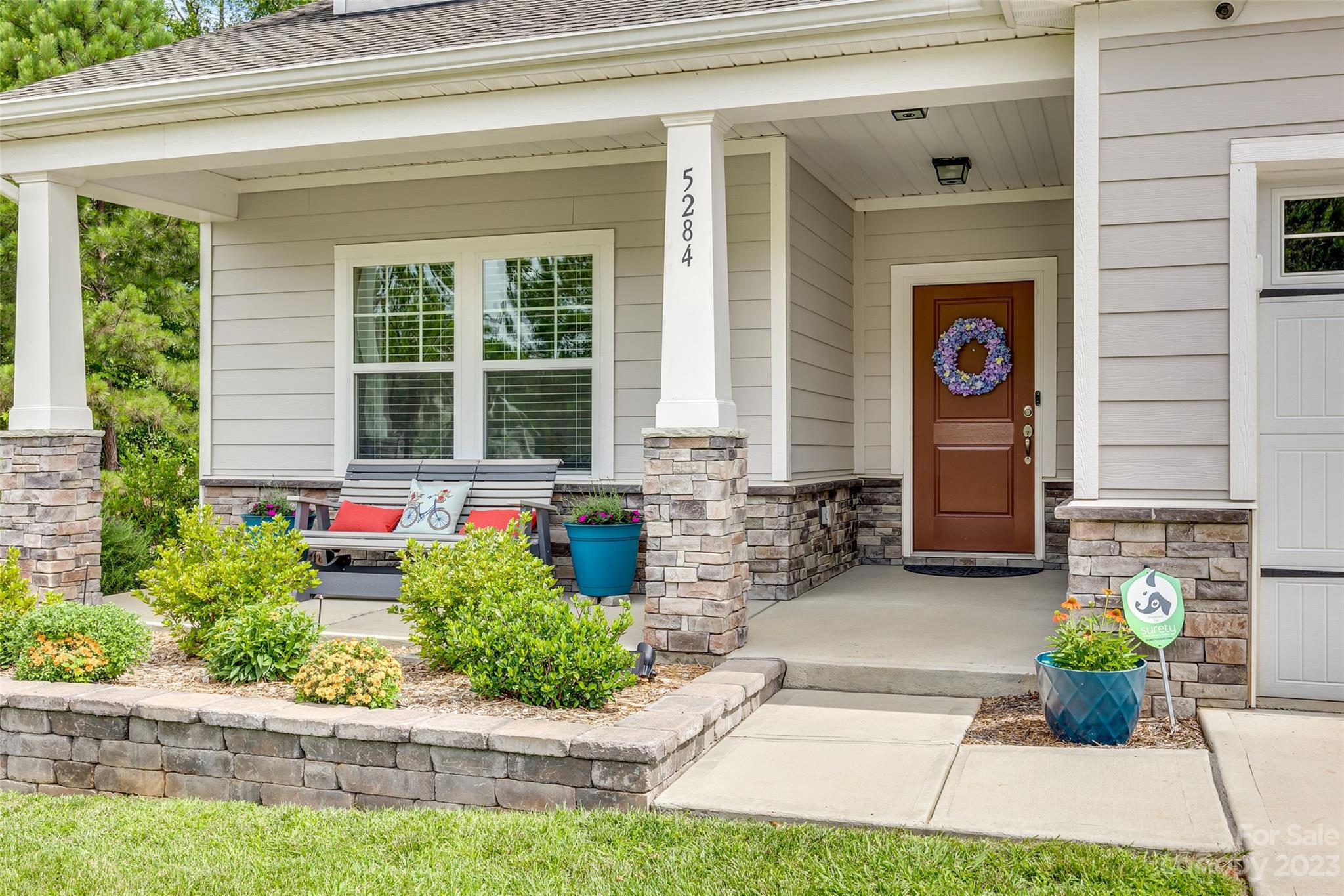 5284 Admirals Landing Lancaster, SC 29720 - Photo 4 of 48 a front view of a house with potted plants