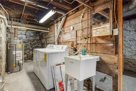 a utility room with a washer and dryer