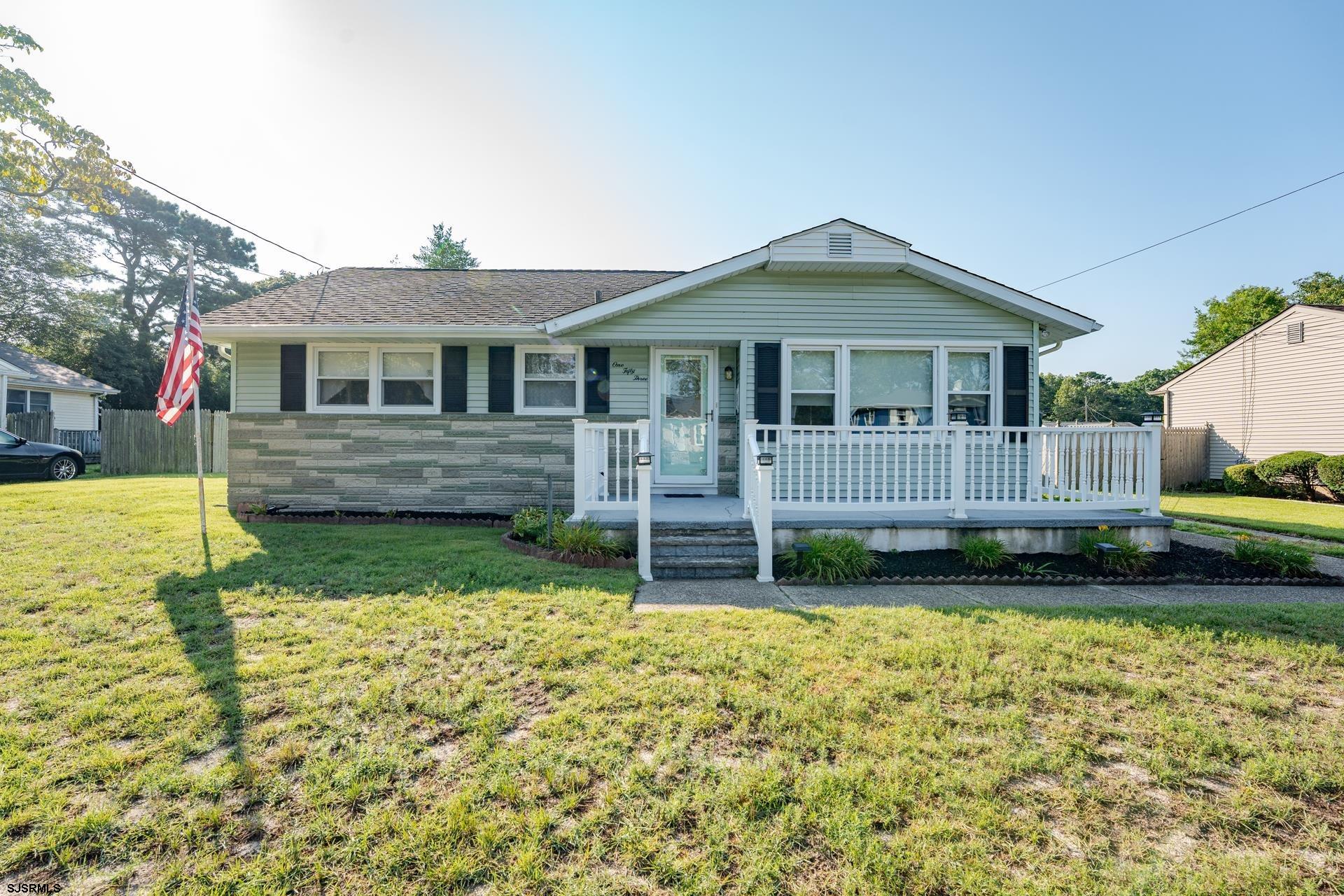 153 Jordan Road Somers Point, NJ 08244 - Photo 1 of 37 a view of a house with a yard and deck