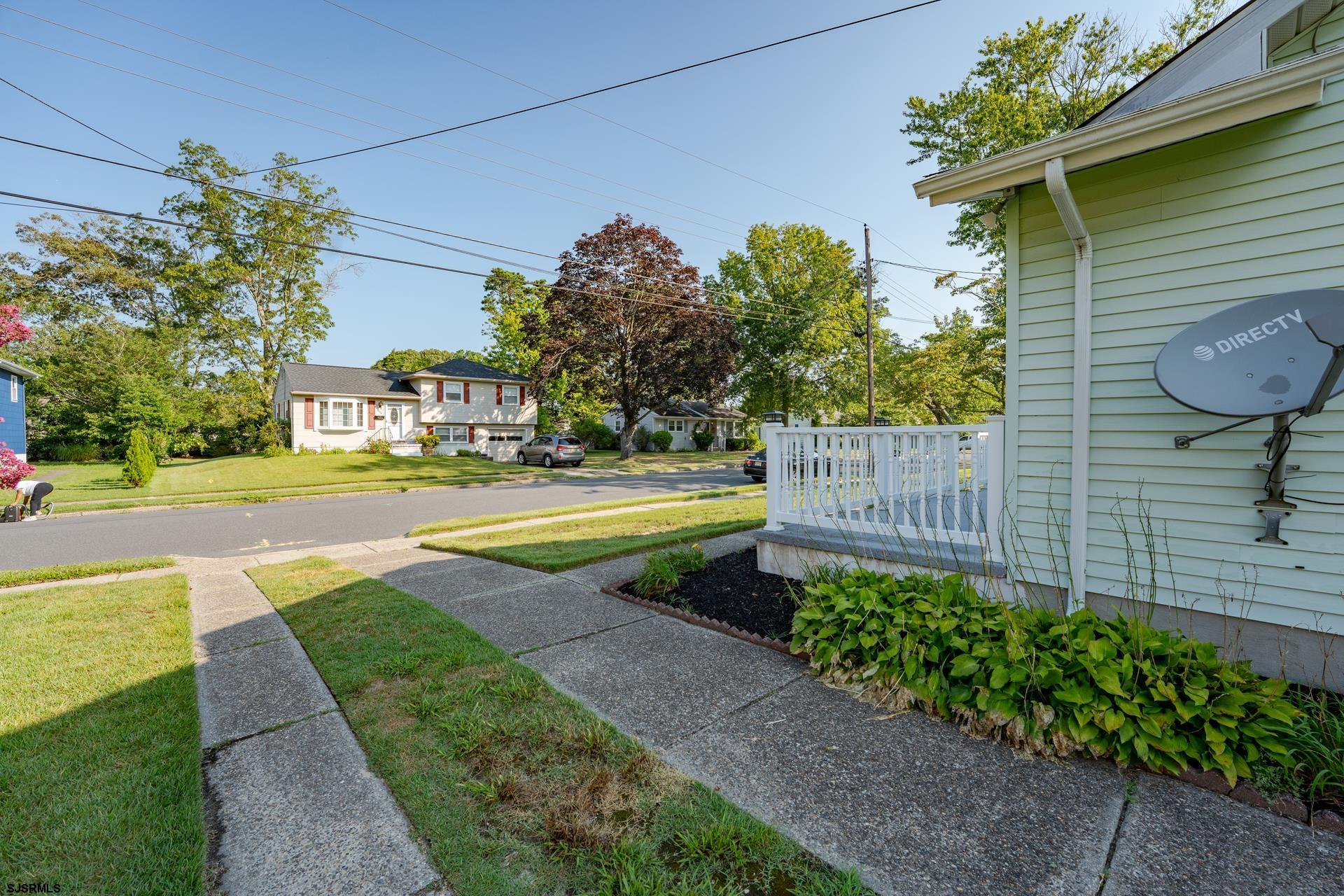 153 Jordan Road Somers Point, NJ 08244 - Photo 23 of 37 a view of a house with a yard and a garden