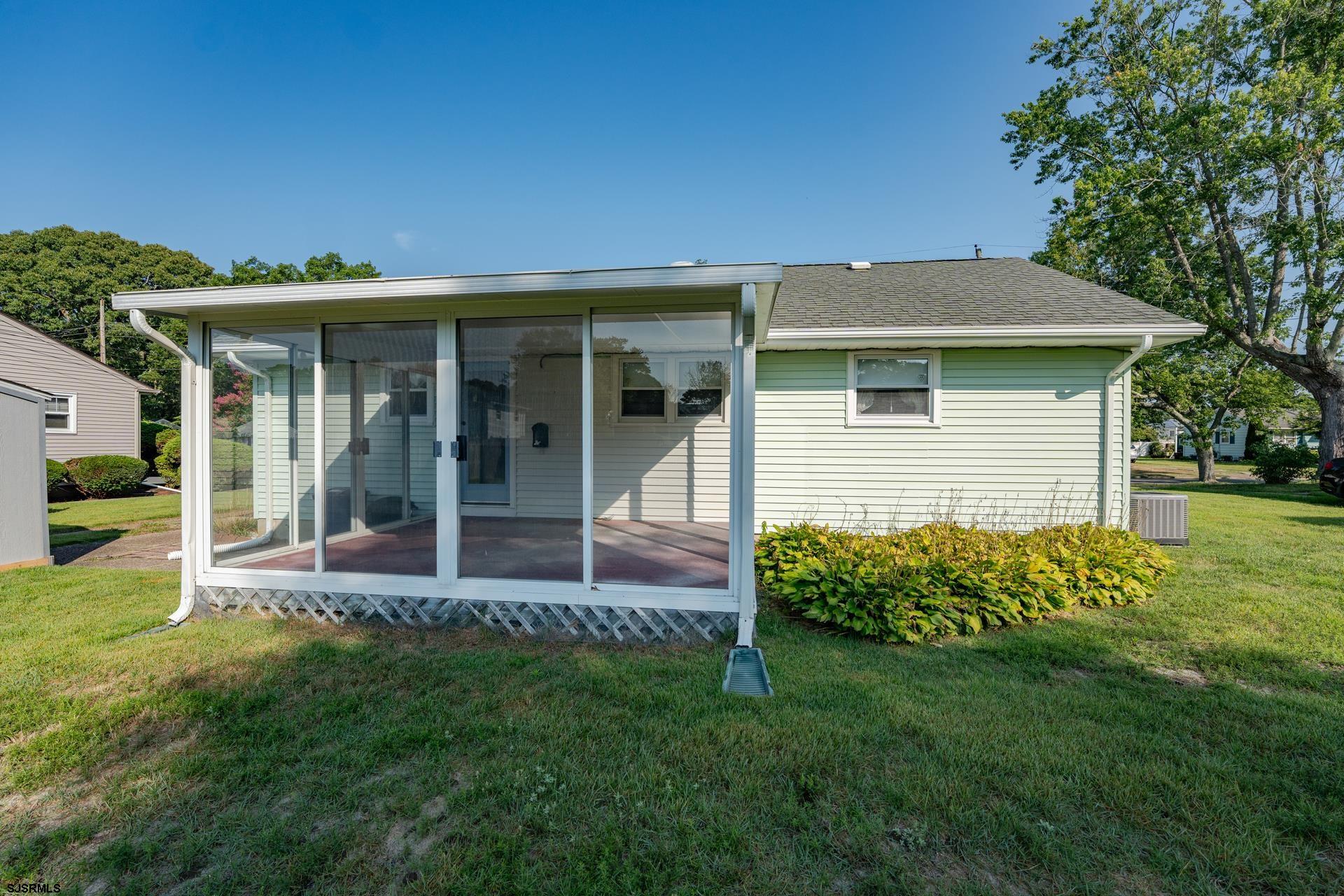 153 Jordan Road Somers Point, NJ 08244 - Photo 29 of 37 a view of a house with backyard and porch