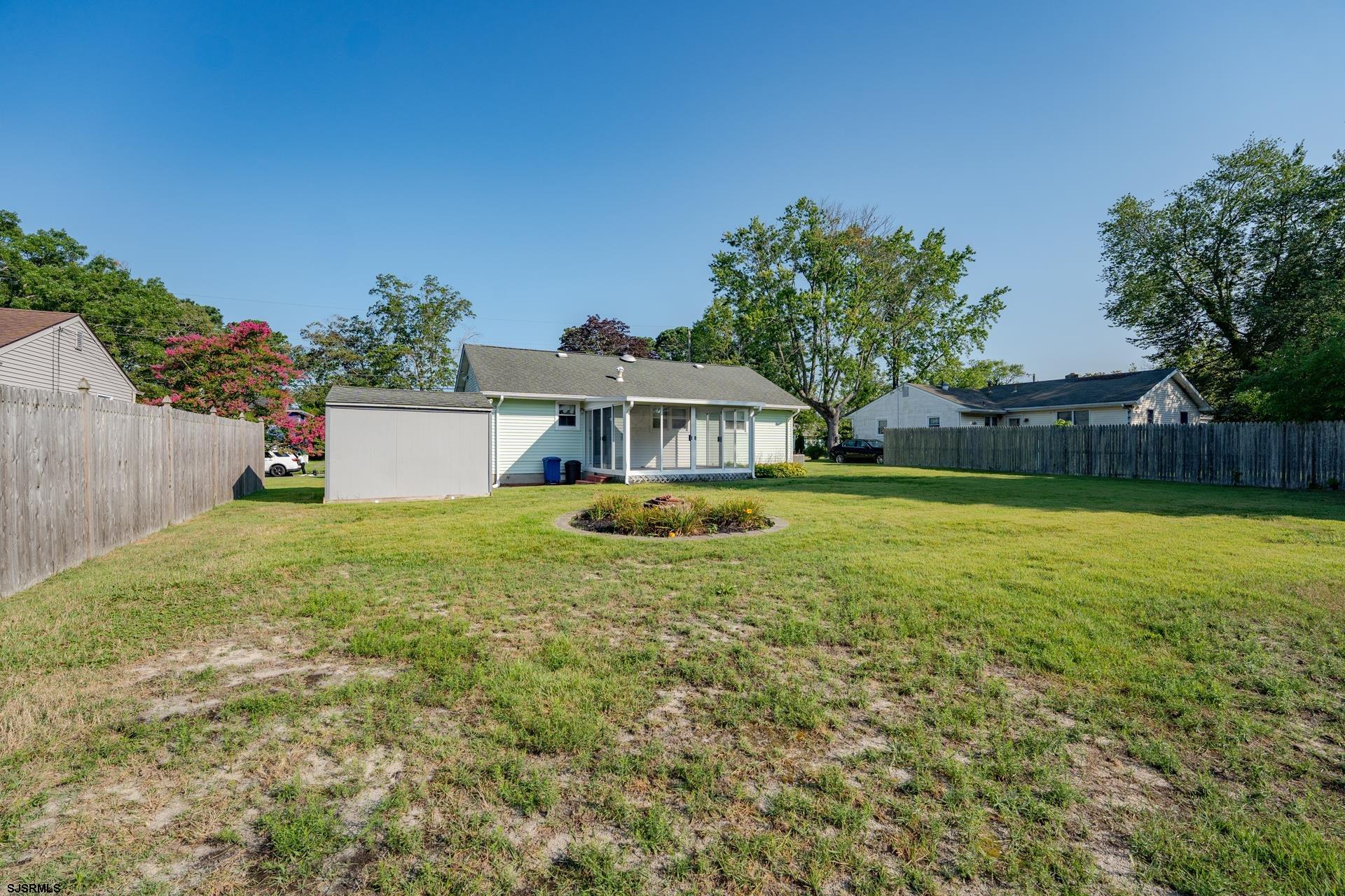 153 Jordan Road Somers Point, NJ 08244 - Photo 32 of 37 a house view with swimming pool in front of it