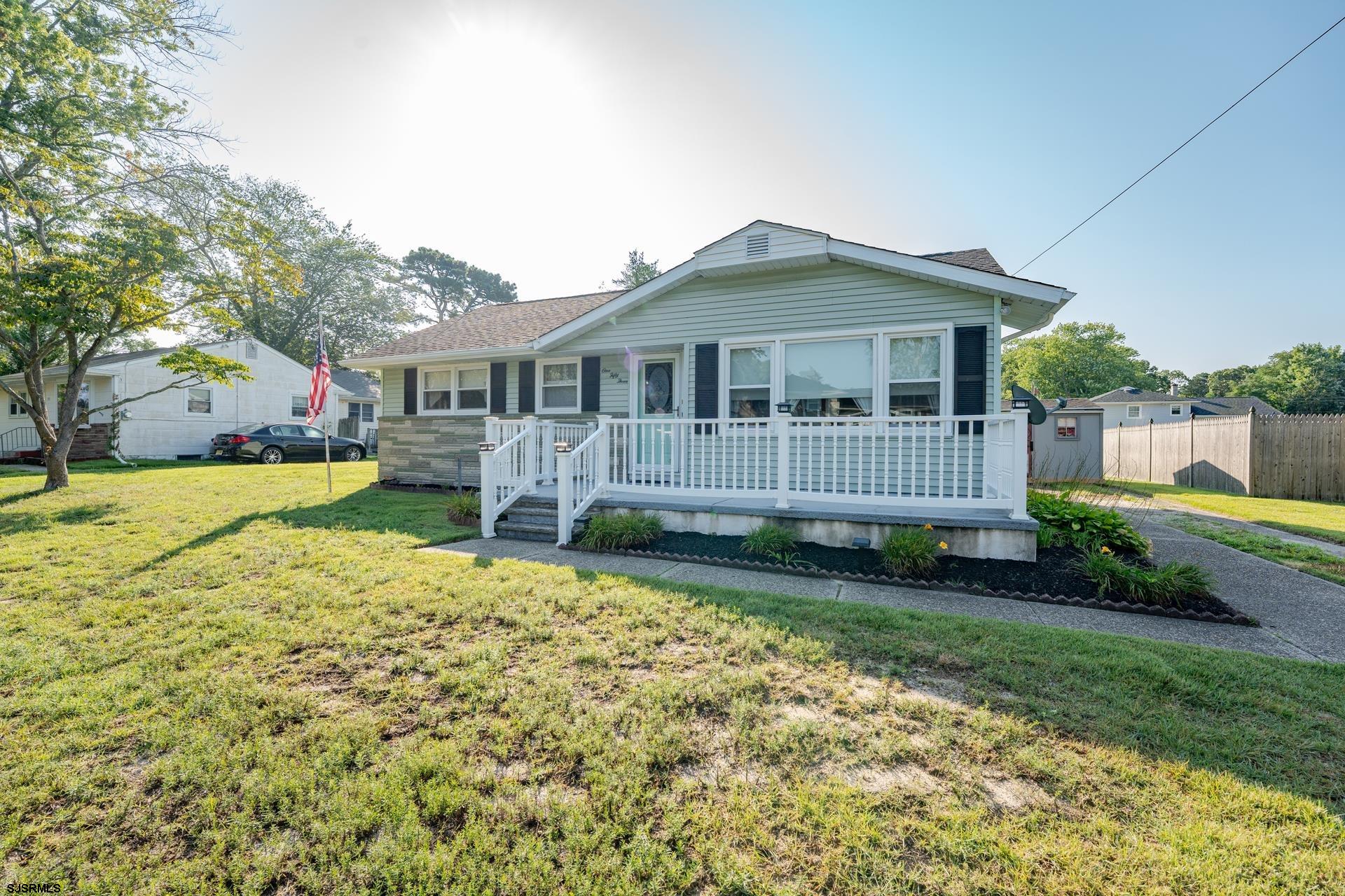 153 Jordan Road Somers Point, NJ 08244 - Photo 4 of 37 a front view of a house with garden