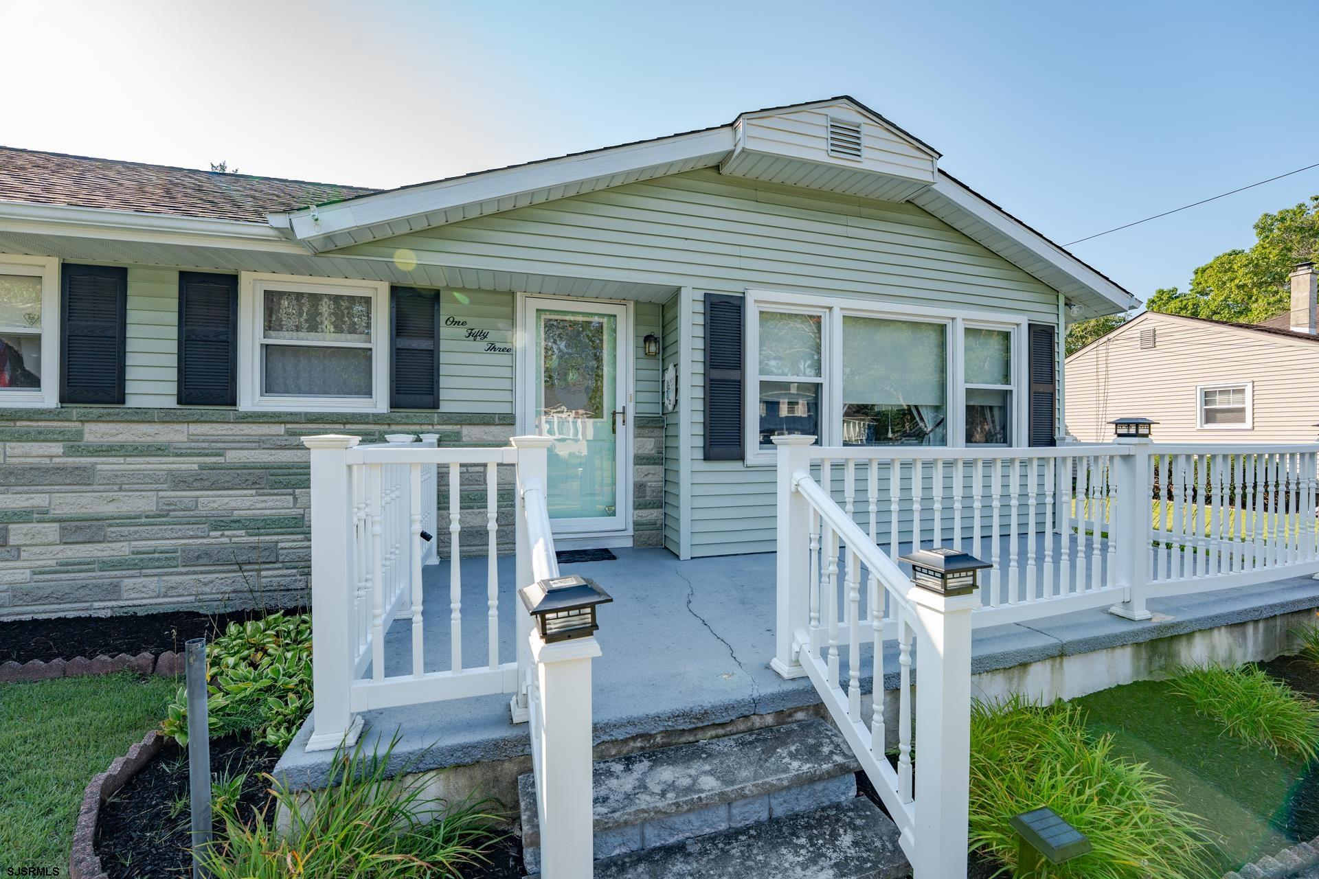 153 Jordan Road Somers Point, NJ 08244 - Photo 7 of 37 front view of a house with a deck