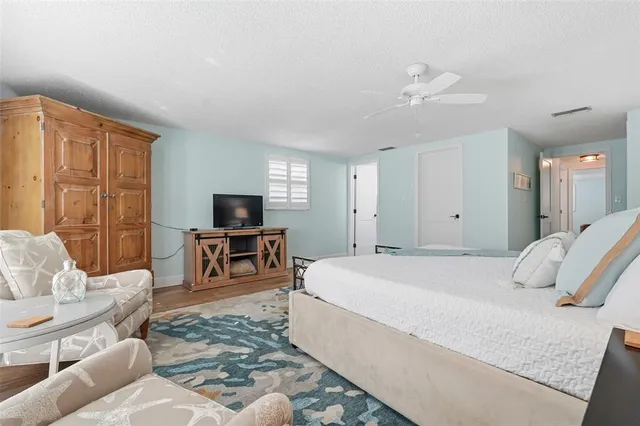 a bedroom with a bed and furniture