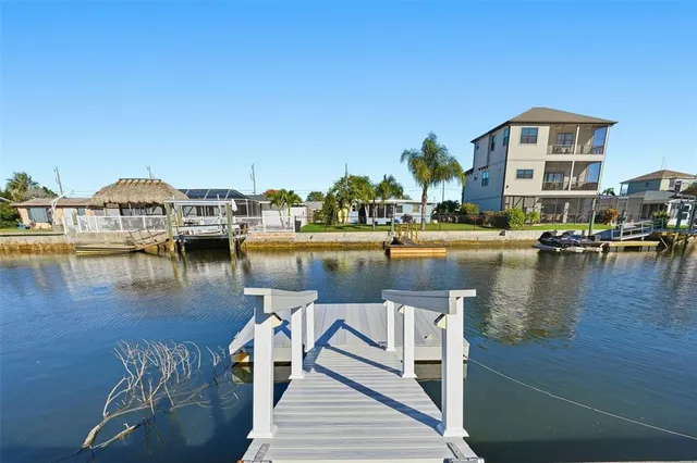 a view of a lake with a building in the background