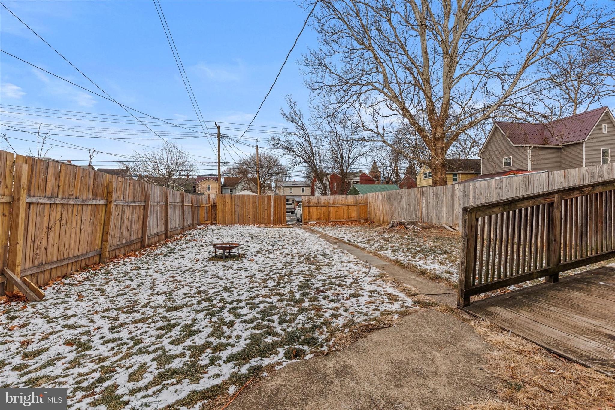 1130 Moore Street Huntingdon, PA 16652 - Photo 15 of 18 a view of a backyard with wooden fence