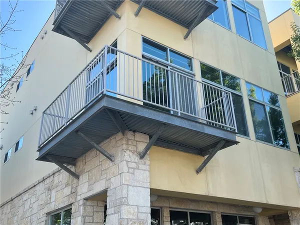 a room with water heater and stairs