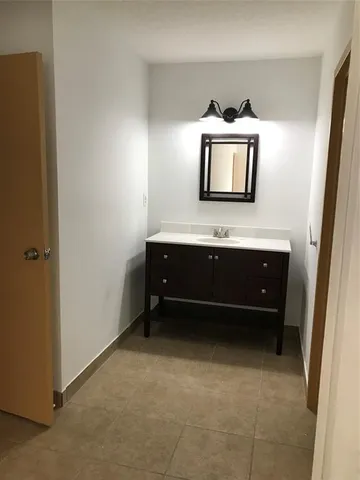 a room with furniture and a window