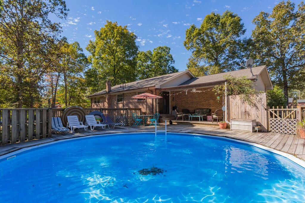 120 Robert Porter Road Dickson, TN 37055 - Photo 3 of 30 Step right out onto the deck with built-in swimming pool!