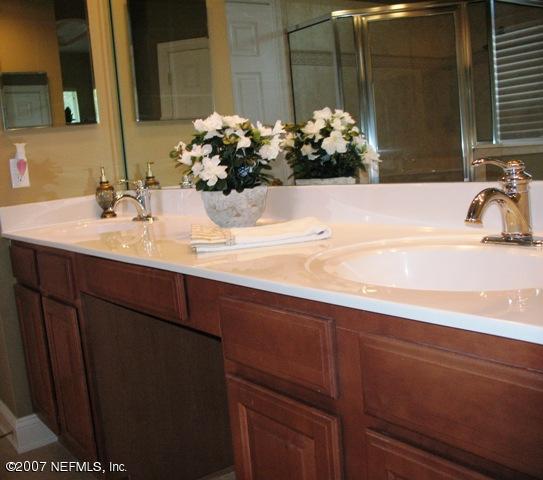 376 North Lombardy Loop Jacksonville, FL 32259 - Photo 17 of 24 a bathroom with a sink and a mirror