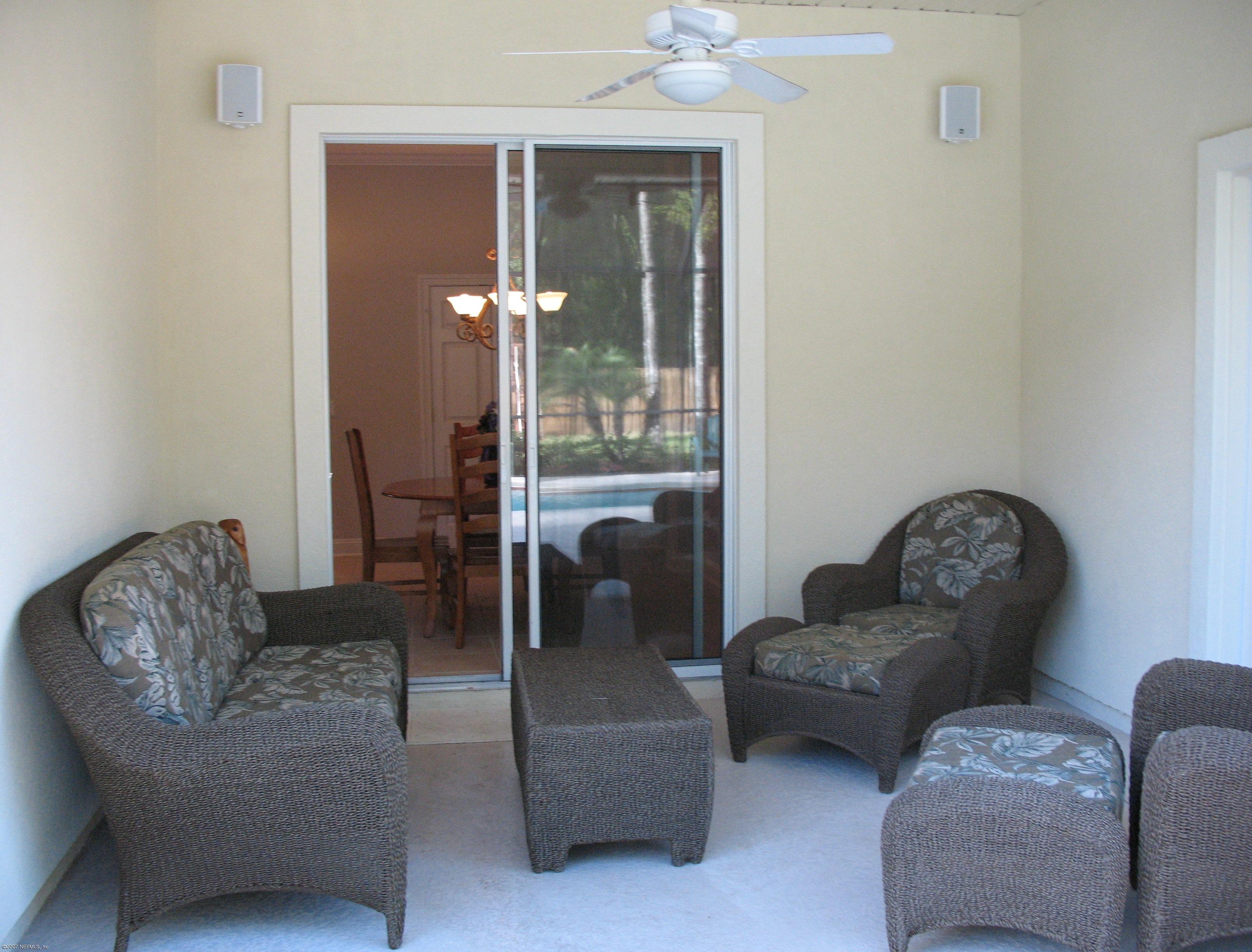 376 North Lombardy Loop Jacksonville, FL 32259 - Photo 19 of 24 a living room with furniture and a fireplace