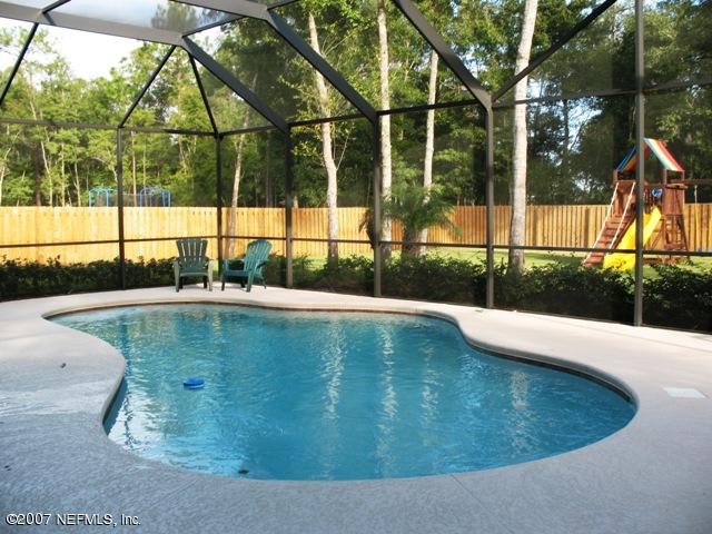 376 North Lombardy Loop Jacksonville, FL 32259 - Photo 20 of 24 a view of a swimming pool with a bench in the background