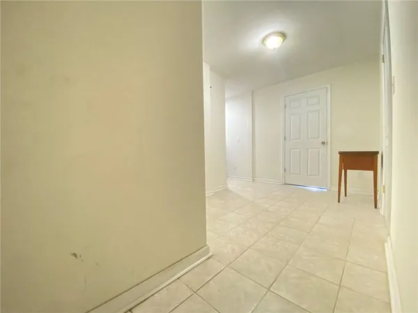 a view of a livingroom with a kitchen
