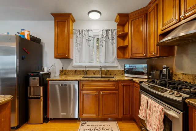 a view of a bench in the backyard