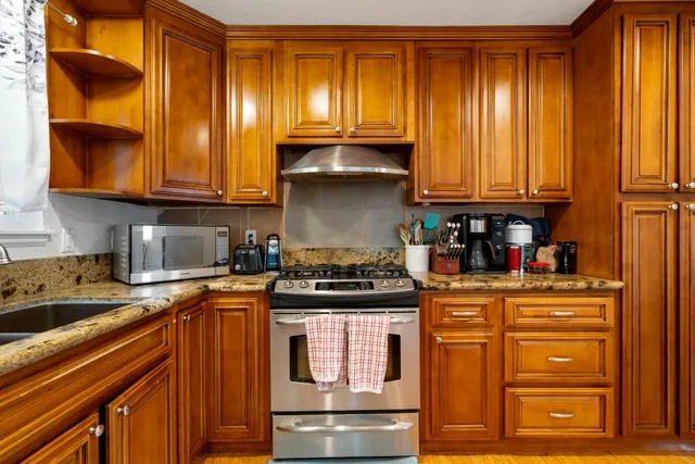 a view of wooden fence and trees