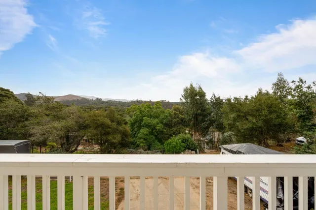a view of backyard with green space