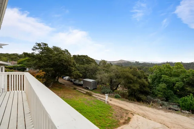a view of a backyard of a house