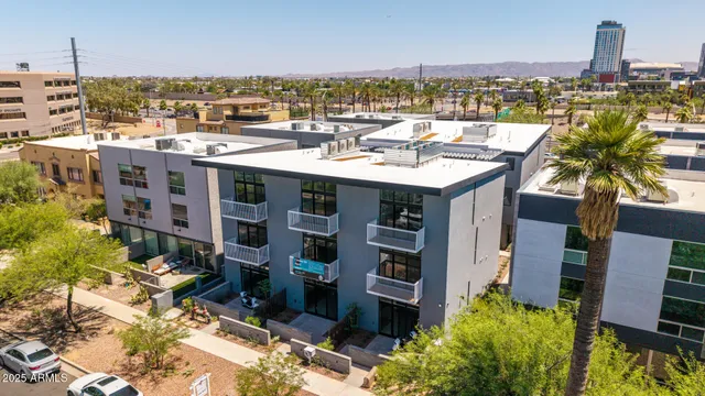 a view of a chairs and table in a backyard