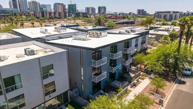 a view of a city with tall buildings