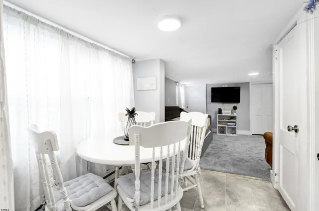 a view of a dining room with furniture
