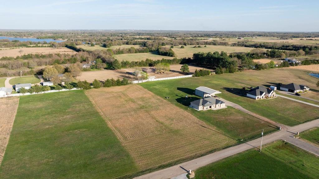 an aerial view of a houses with a outdoor space