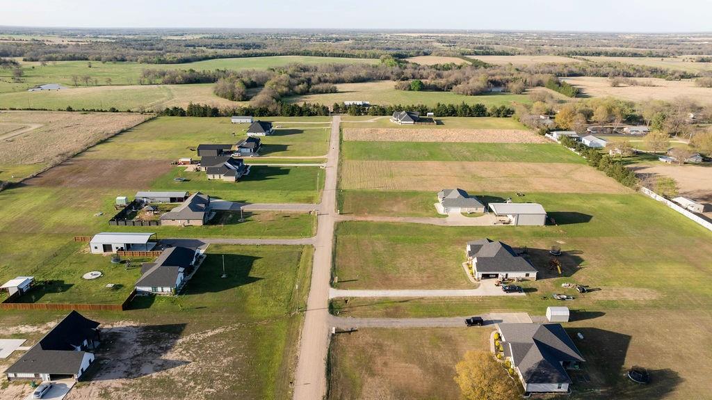 33082 Sumner Tx 75486 Sumner, TX 75486 - Photo 19 of 26 an aerial view of residential houses with outdoor space
