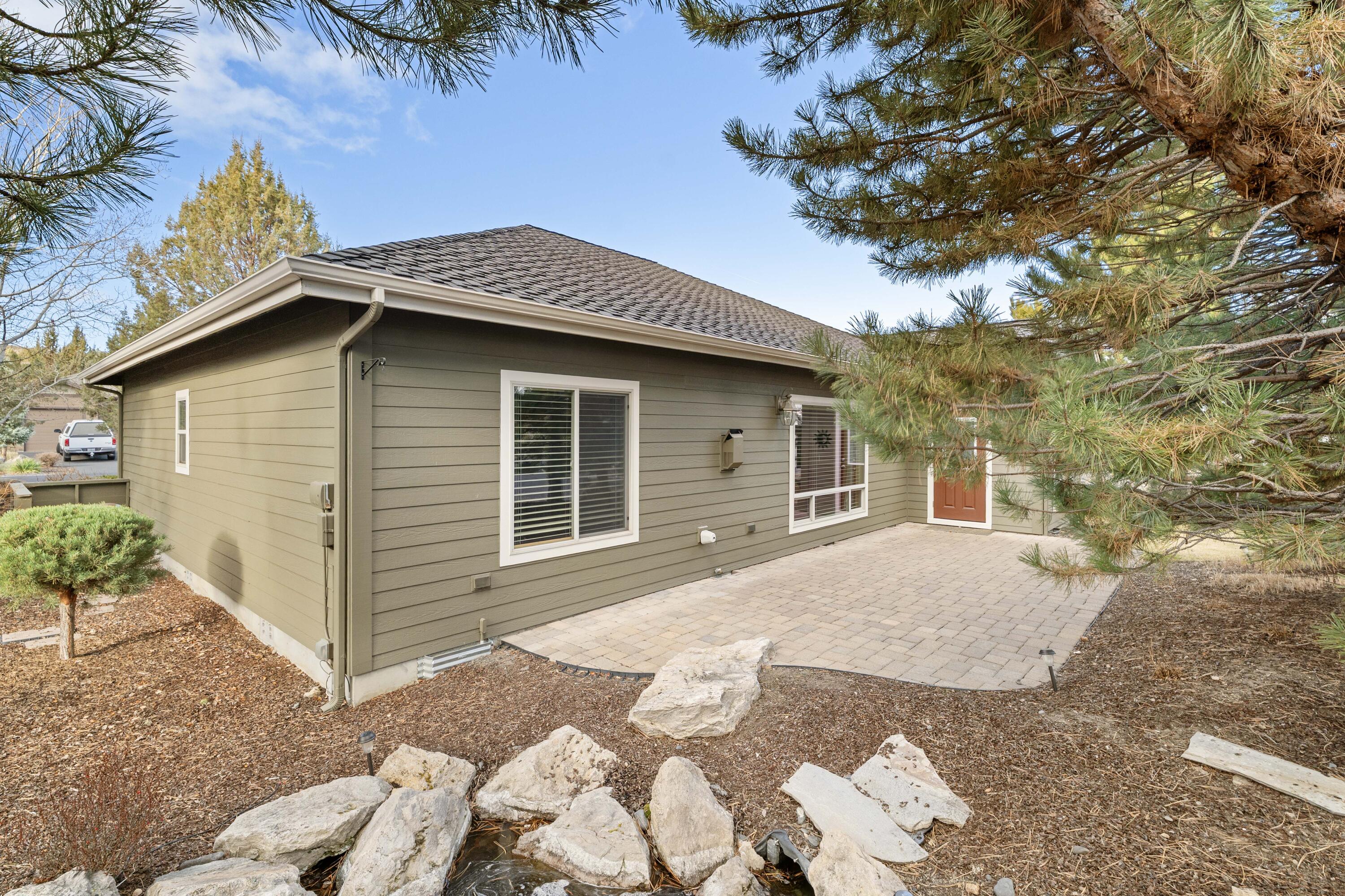 784 Ribbon Falls Road Redmond, OR 97756 - Photo 35 of 79 a front view of a house with a yard and garage