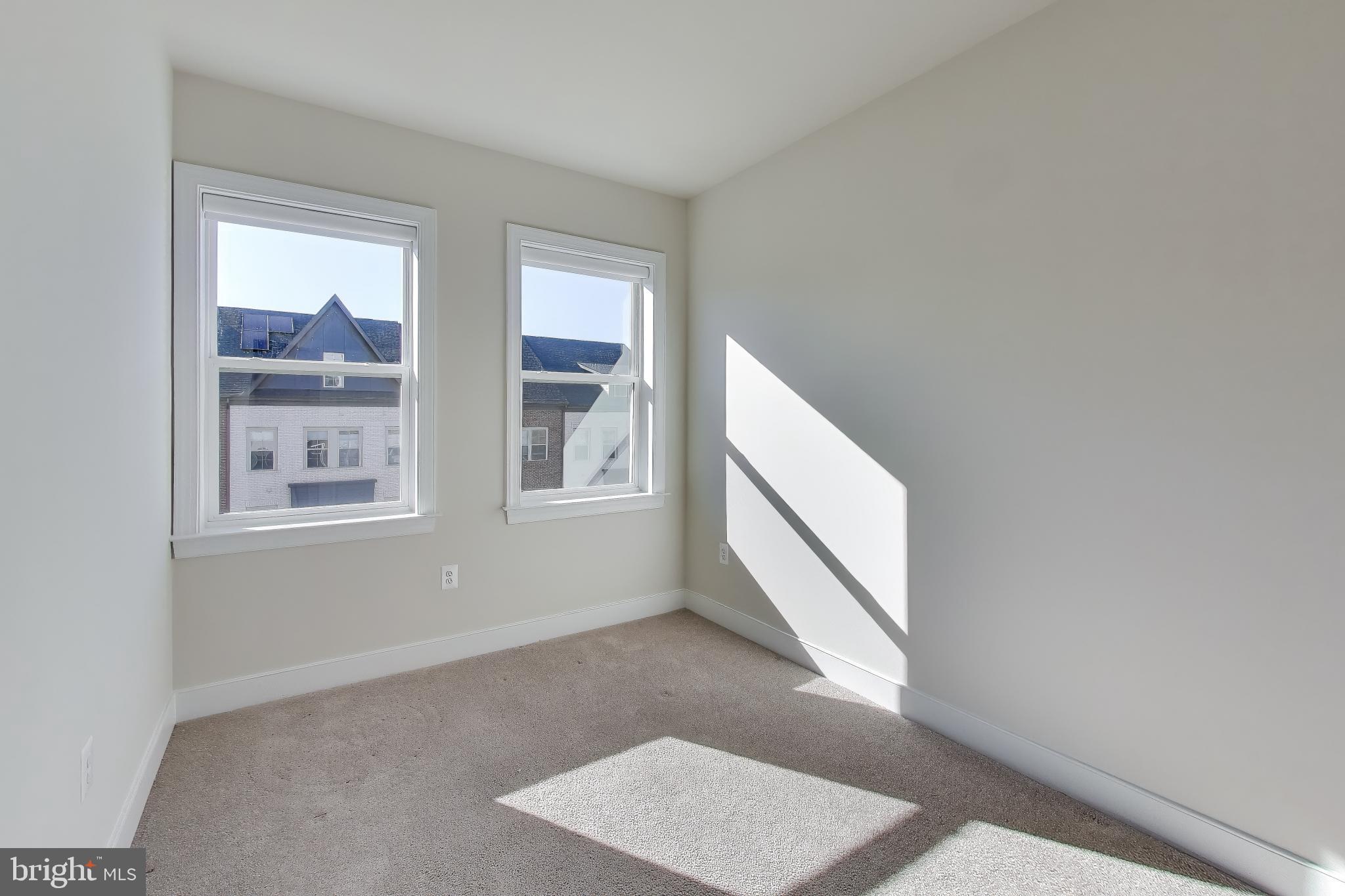 111 Armstrong Place Gaithersburg, MD 20878 - Photo 23 of 50 a view of an entryway with wooden floor and door