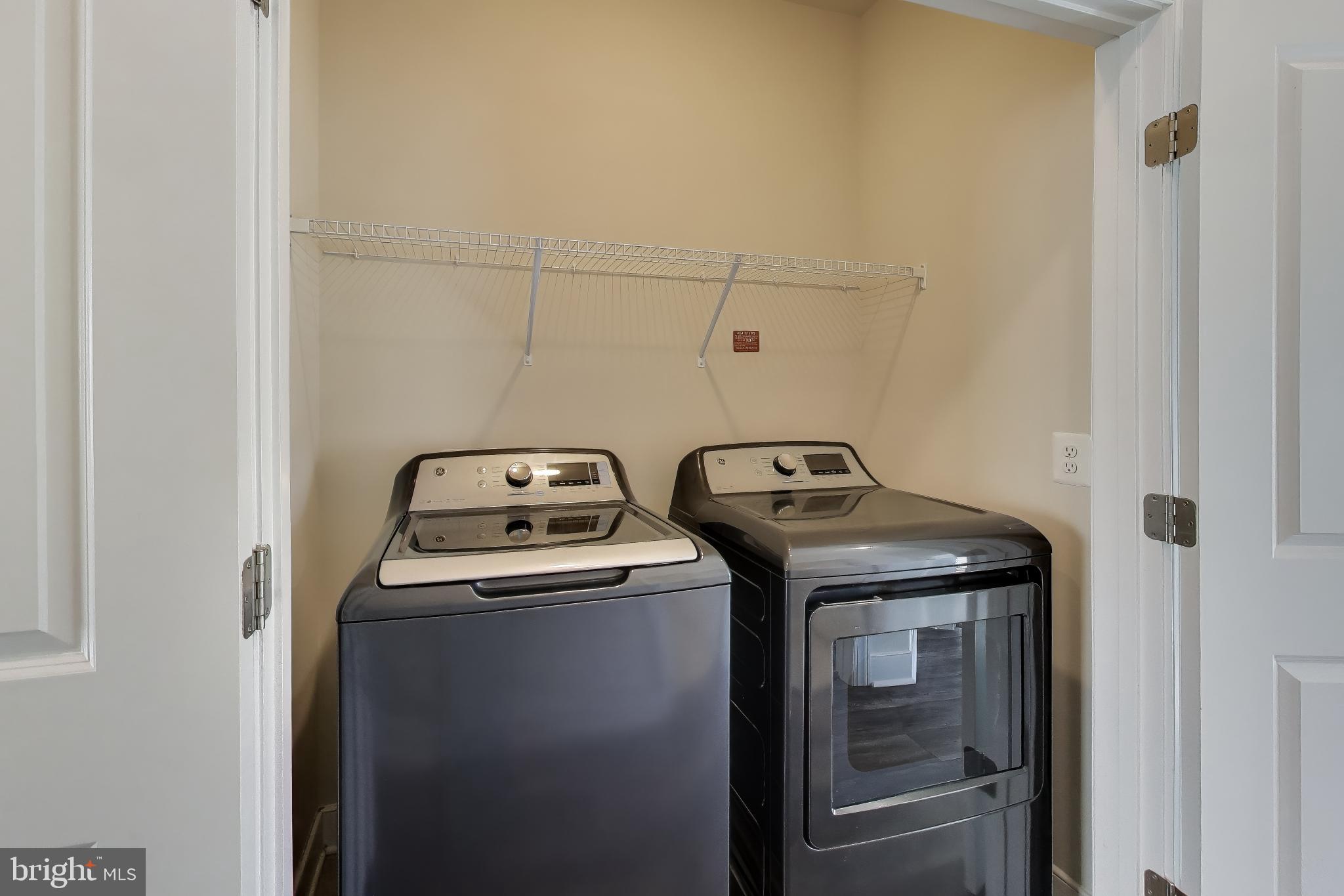 111 Armstrong Place Gaithersburg, MD 20878 - Photo 25 of 50 a utility room with dryer and washer
