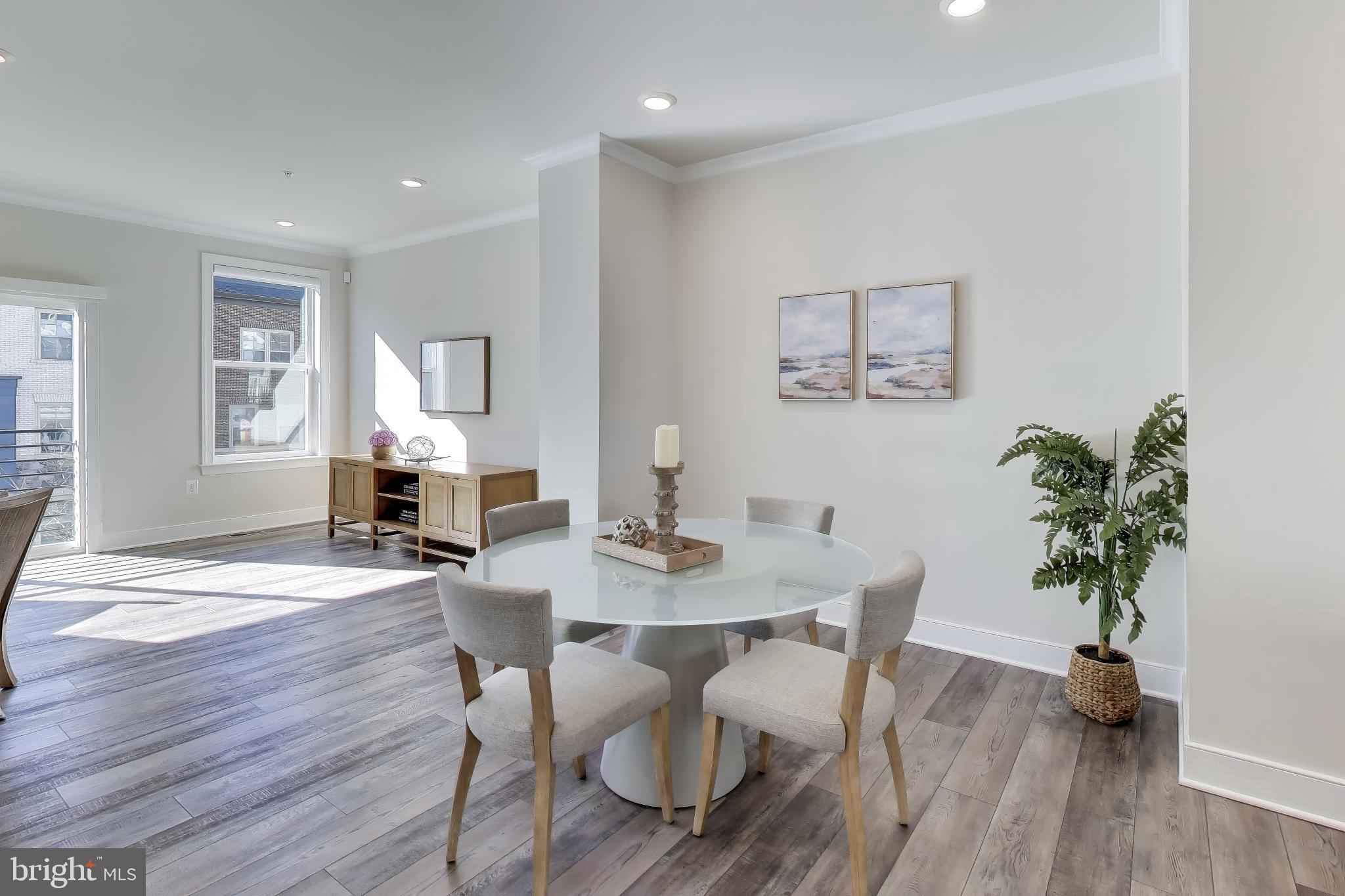111 Armstrong Place Gaithersburg, MD 20878 - Photo 9 of 50 a view of a dining room with furniture and wooden floor