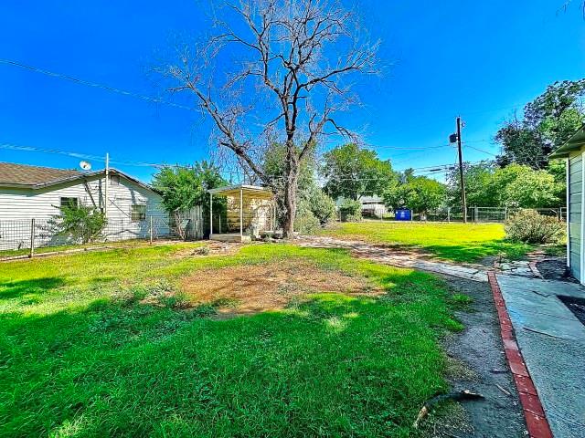 903 North 4th Street Ballinger, TX 76821 - Photo 7 of 12 a view of swimming pool with garden