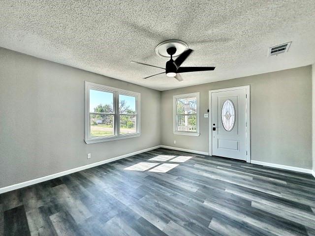 903 North 4th Street Ballinger, TX 76821 - Photo 8 of 12 a view of an empty room and window
