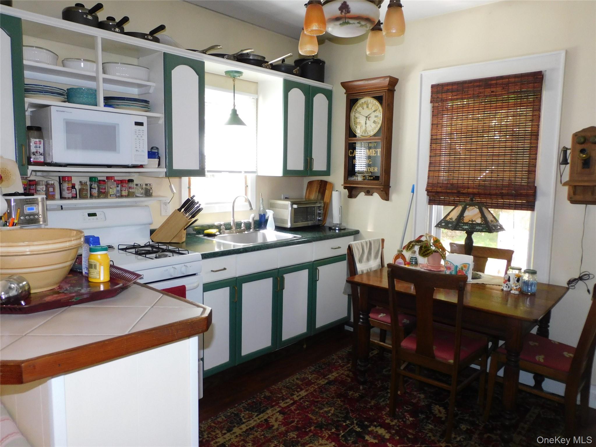18-20 Church Road Mountain Dale, NY 12763 - Photo 16 of 20 a kitchen that has a table and chairs in it
