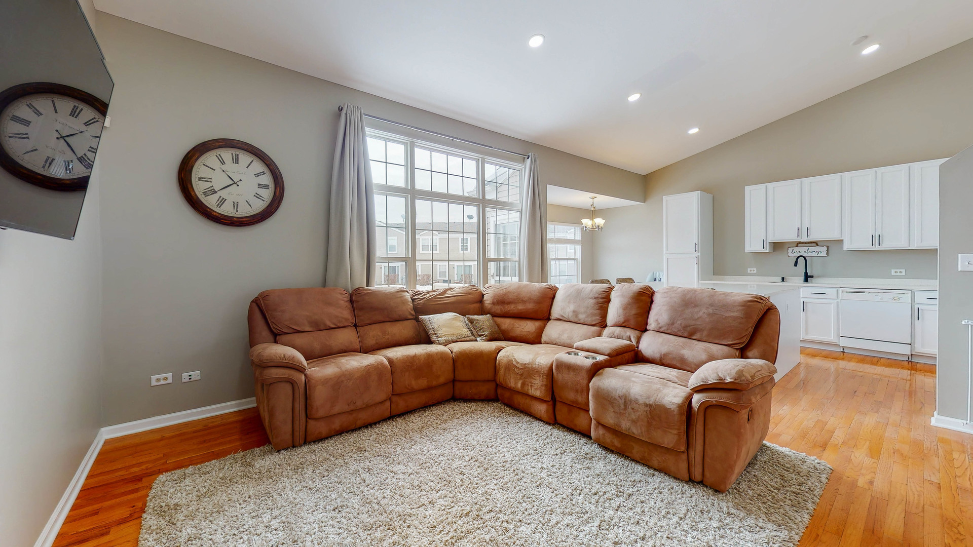 16031 Golf View Drive Lockport, IL 60441 - Photo 11 of 23 a living room with furniture a clock and a window