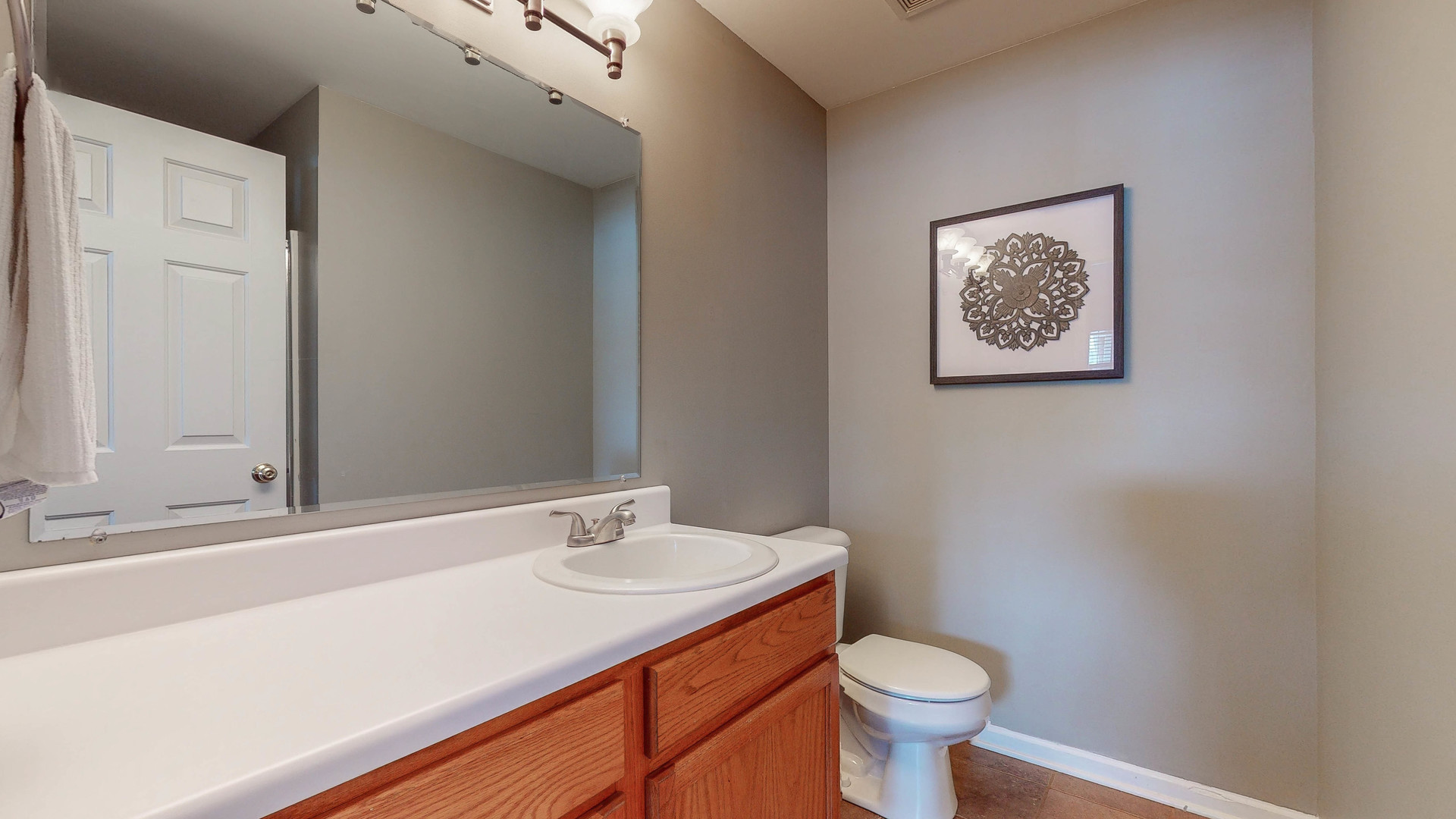 16031 Golf View Drive Lockport, IL 60441 - Photo 19 of 23 a bathroom with a sink and a toilet