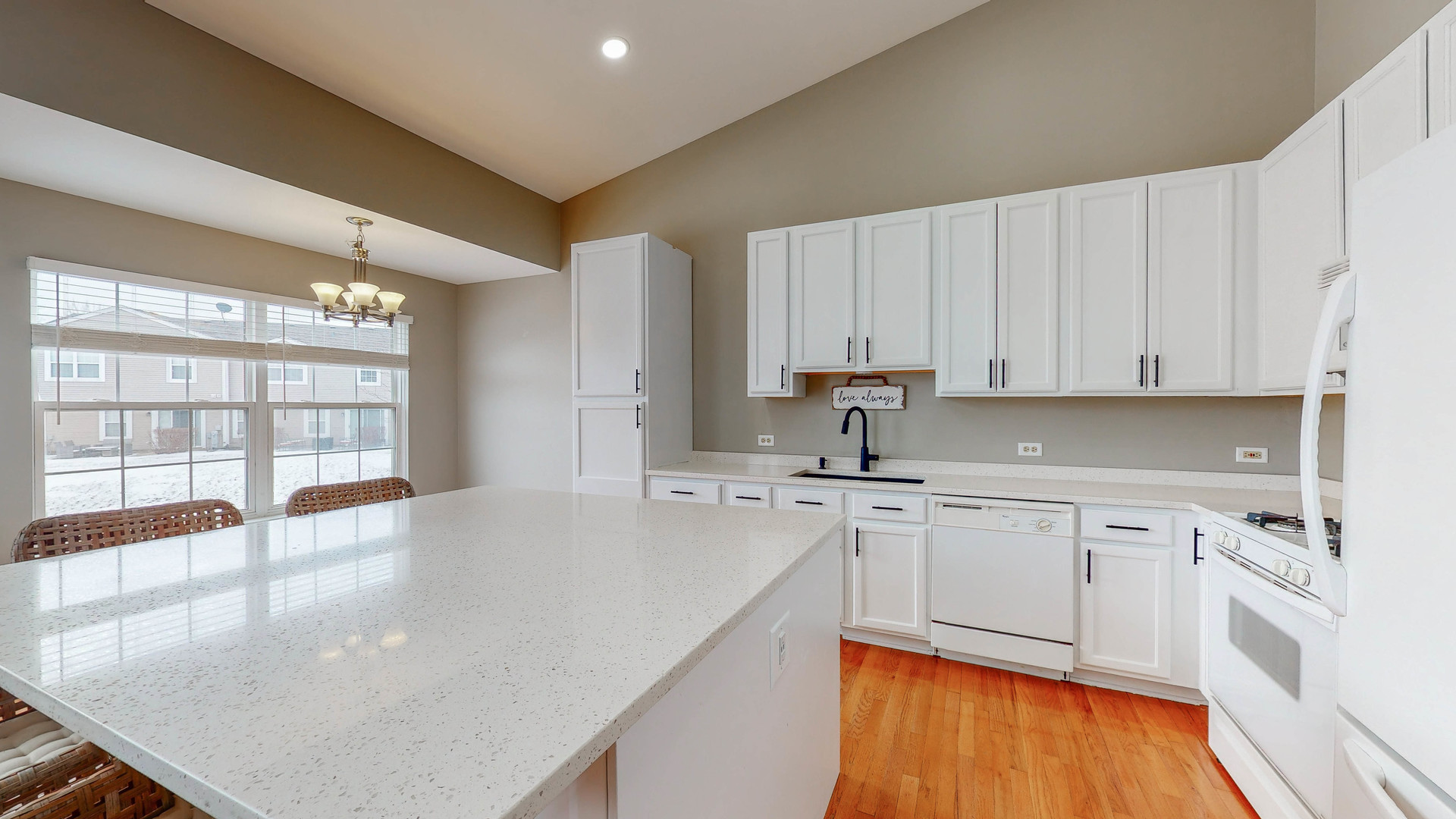 16031 Golf View Drive Lockport, IL 60441 - Photo 5 of 23 a kitchen with stainless steel appliances granite countertop a stove a sink and white cabinets