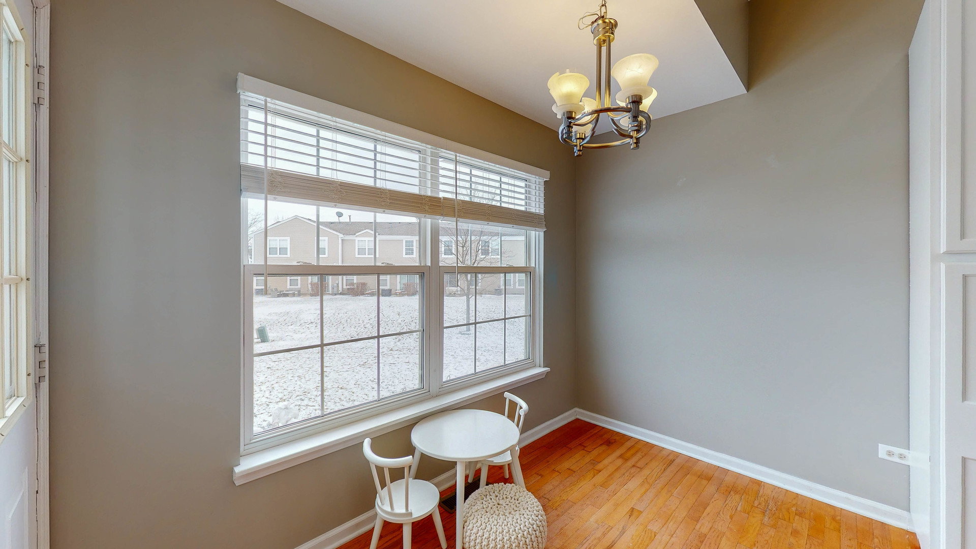 16031 Golf View Drive Lockport, IL 60441 - Photo 6 of 23 a view of a room with windows and chandelier