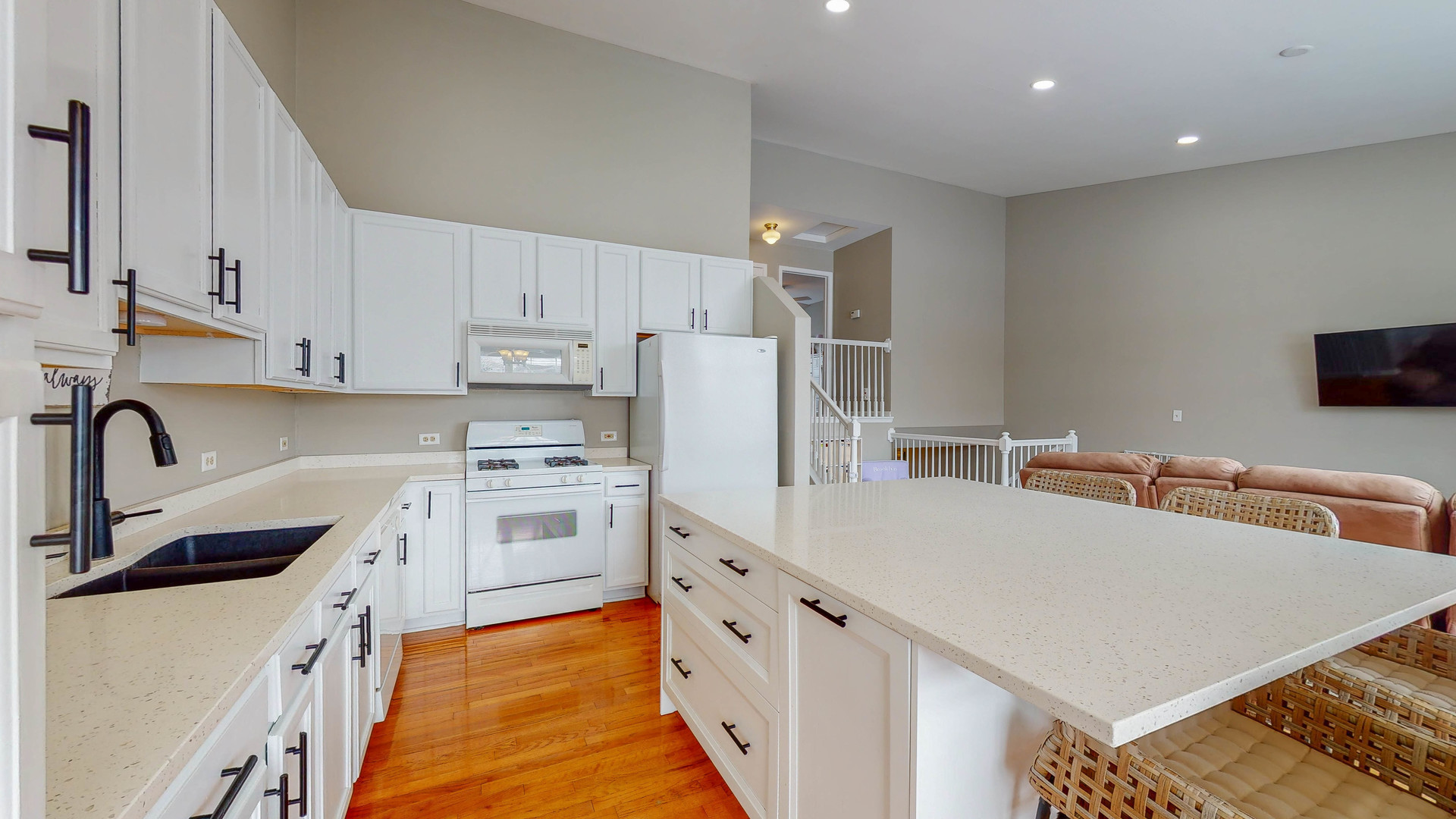 16031 Golf View Drive Lockport, IL 60441 - Photo 8 of 23 a kitchen with stainless steel appliances a white stove top oven a sink a refrigerator and white cabinets